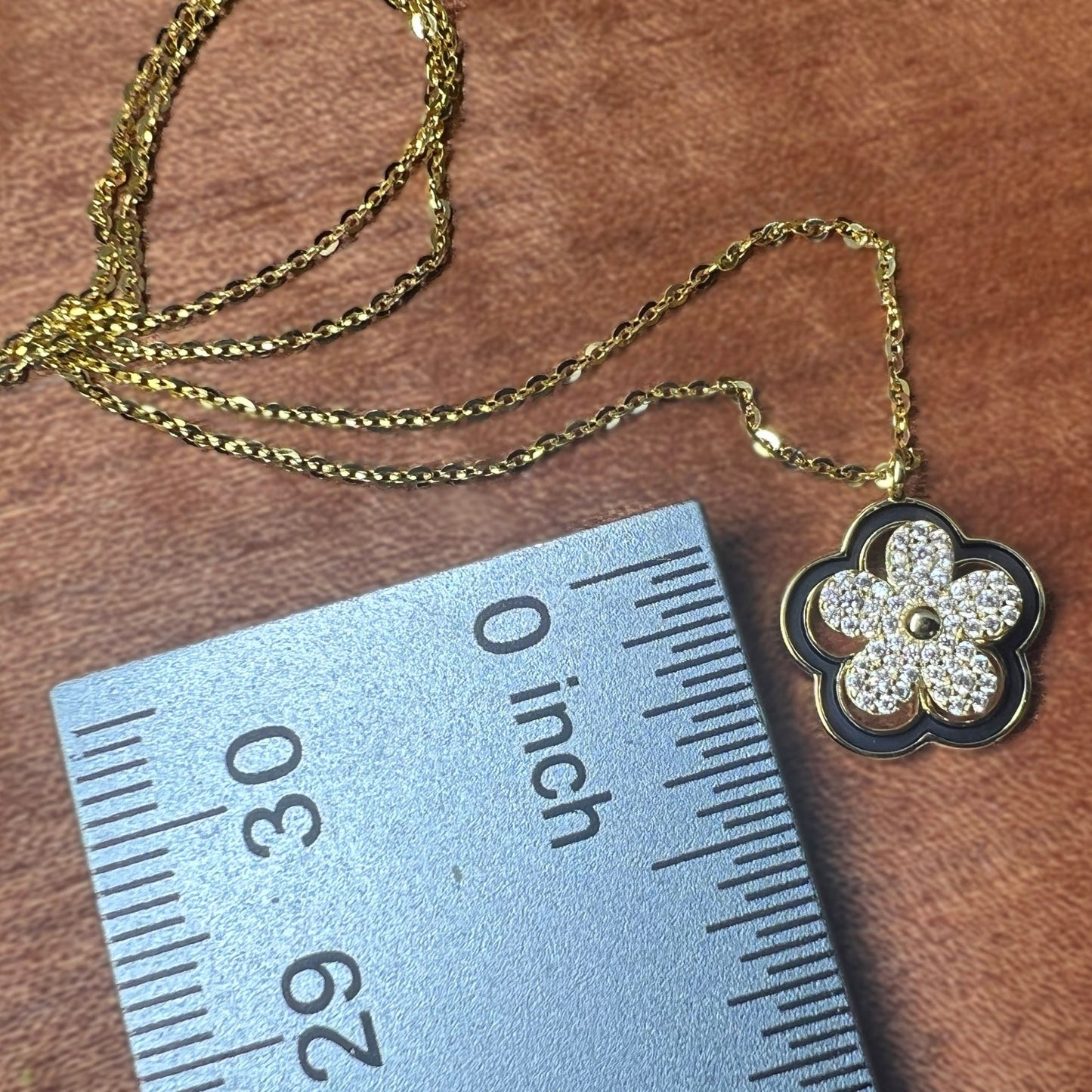 Spinner CZ Plumeria Flower Pendant