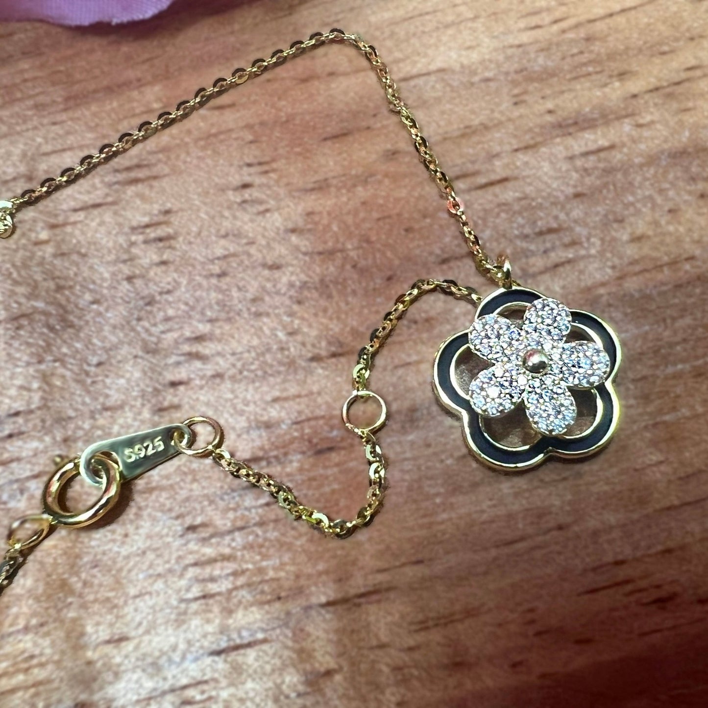 Spinner CZ Plumeria Flower Pendant