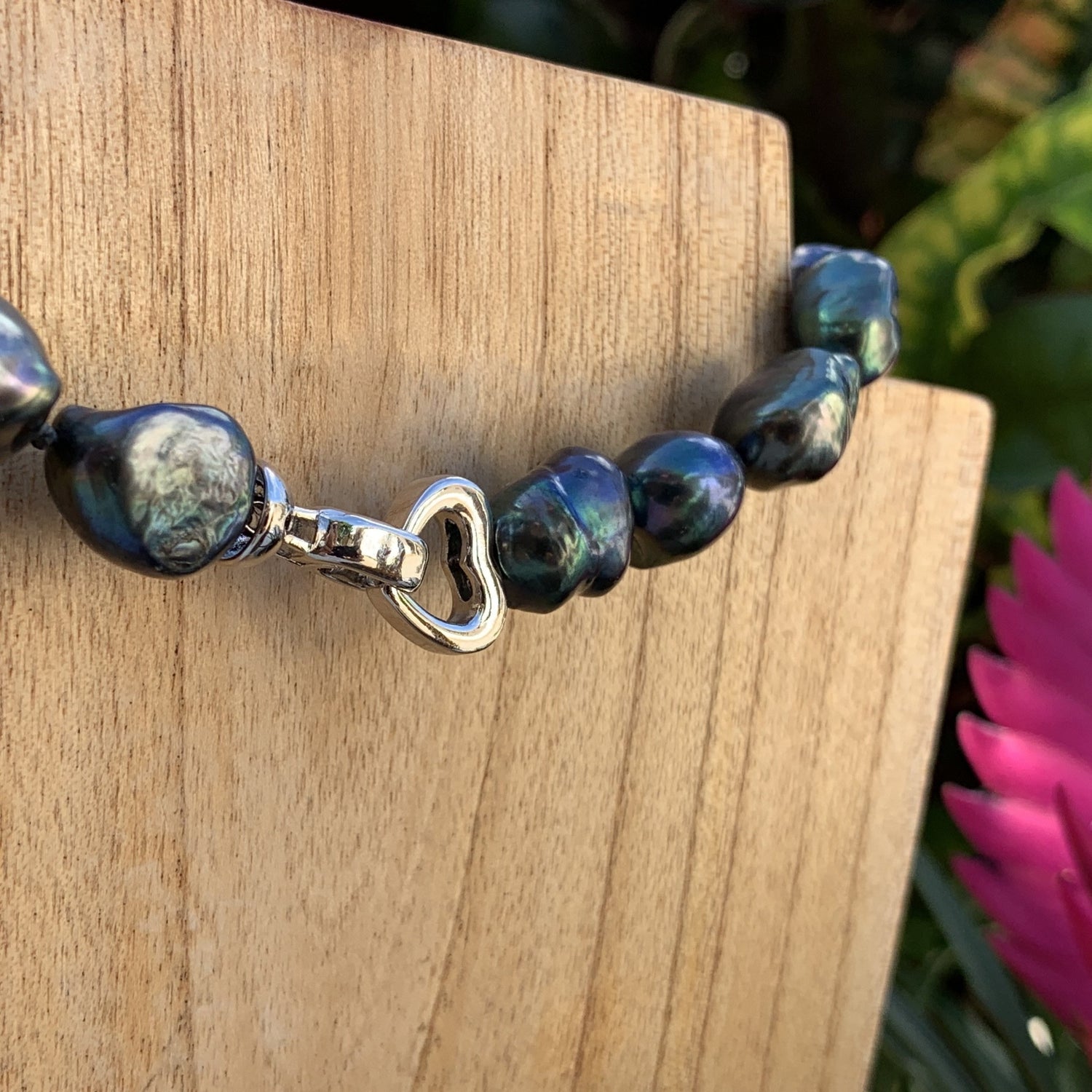 Close up of Baroque pearl necklace clasp.