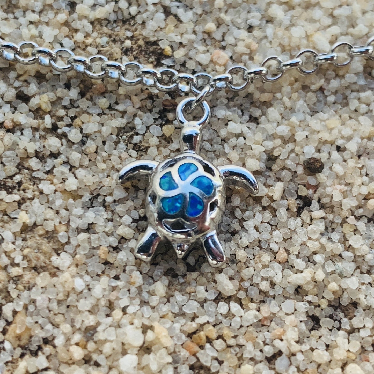 Sea life charm bracelet showing turtle charm.
