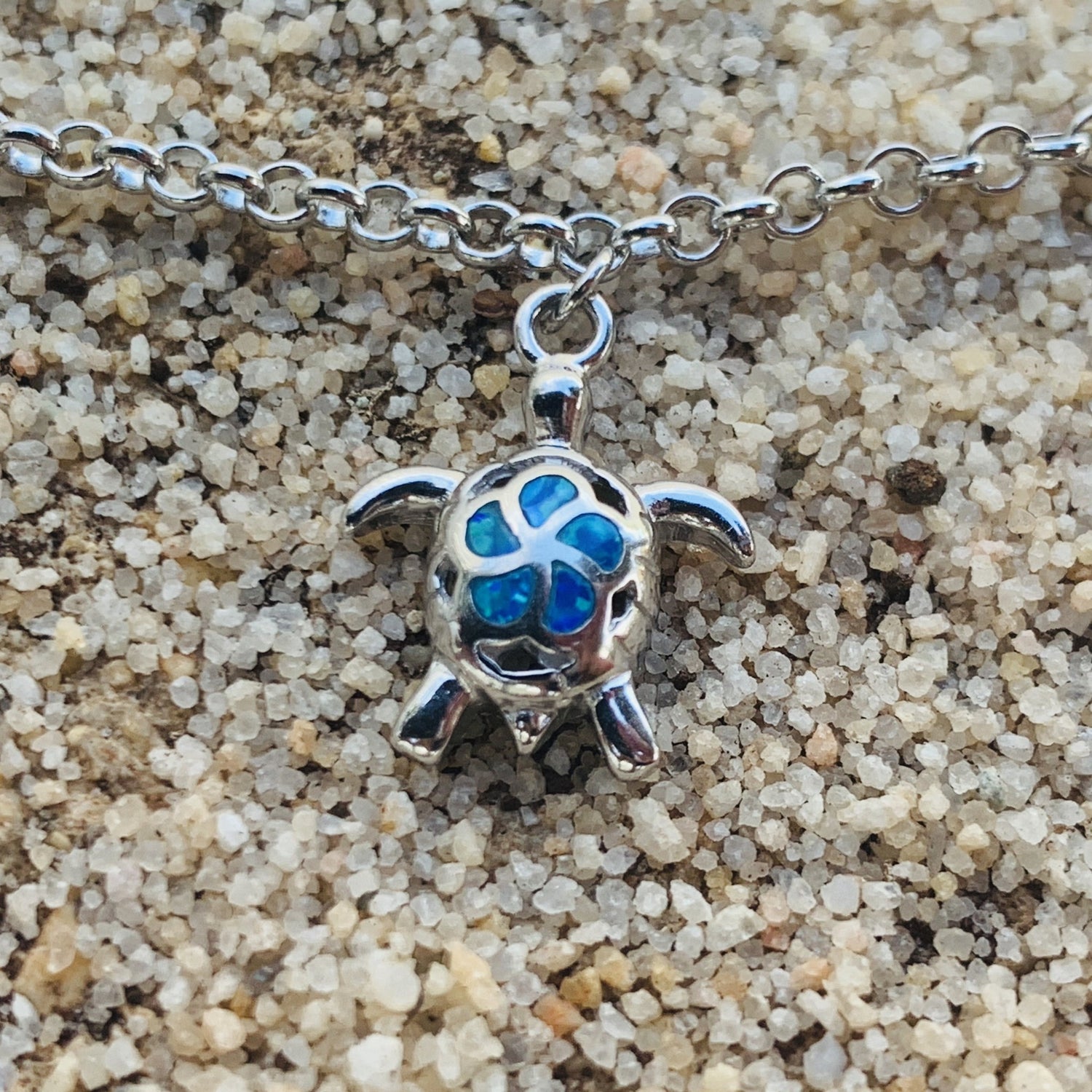 Sea life charm bracelet showing turtle charm.