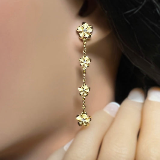 Four Plumeria CZ Waterfall Dangle Earrings on model