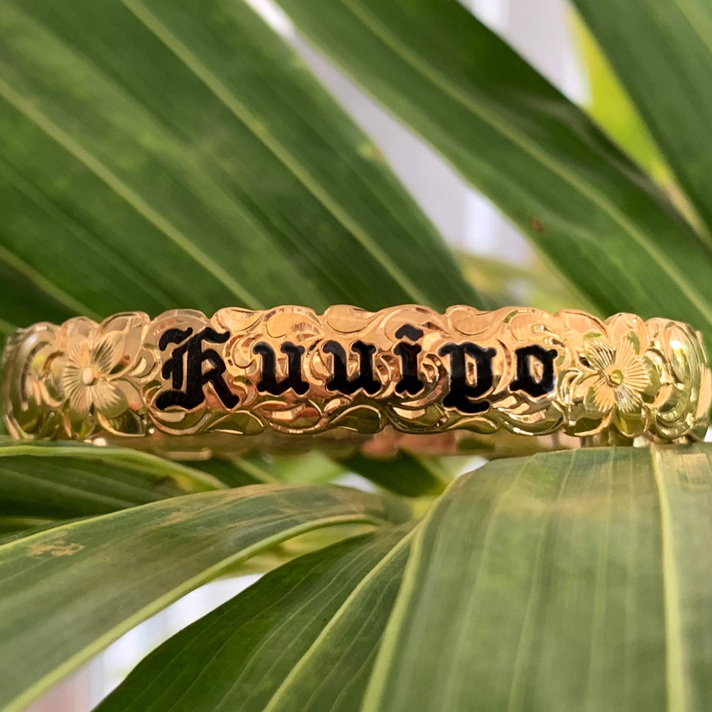 Custom 10mm Bracelet with black enamel lettering and scallop edge design.