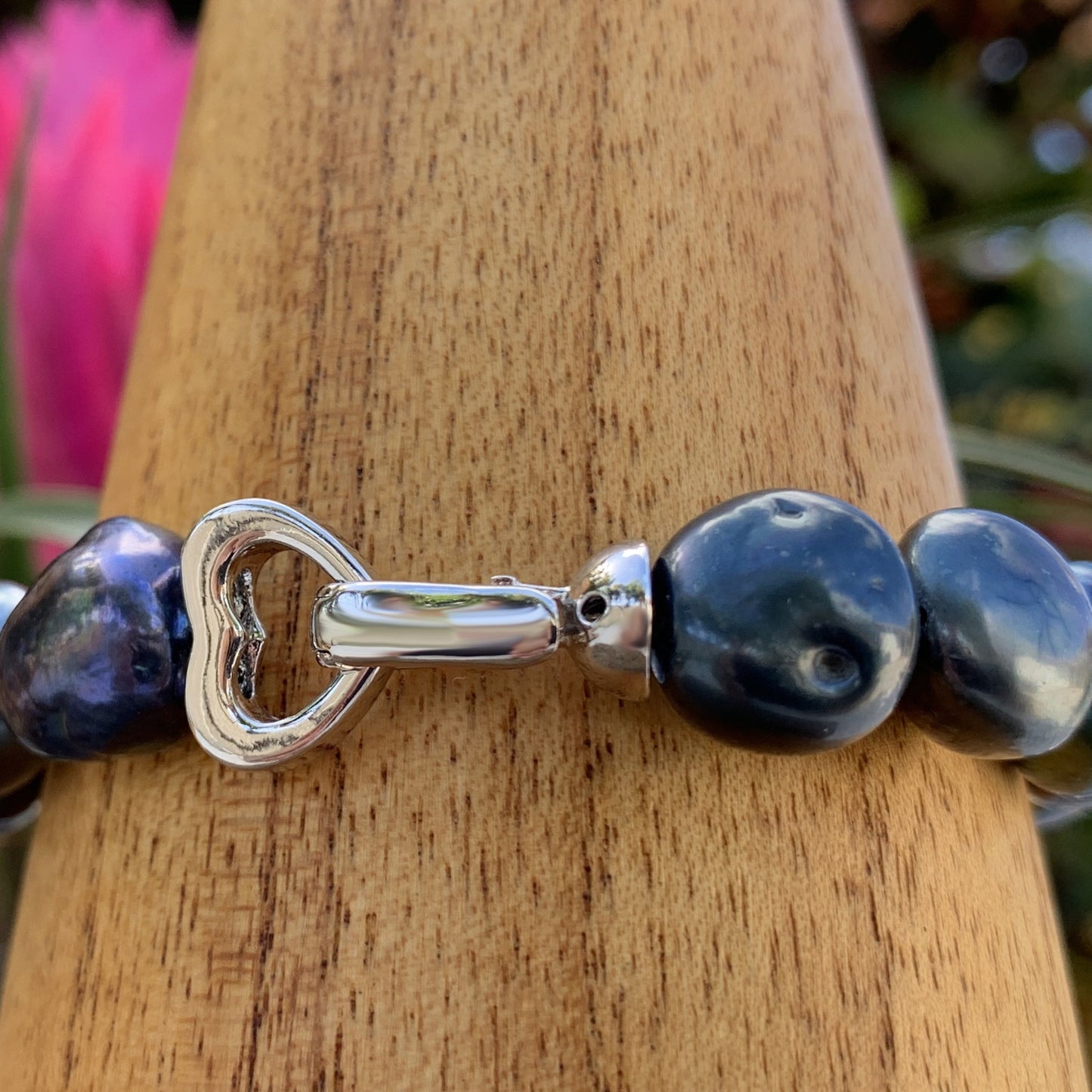 Close up of Baroque pearl necklace clasp.