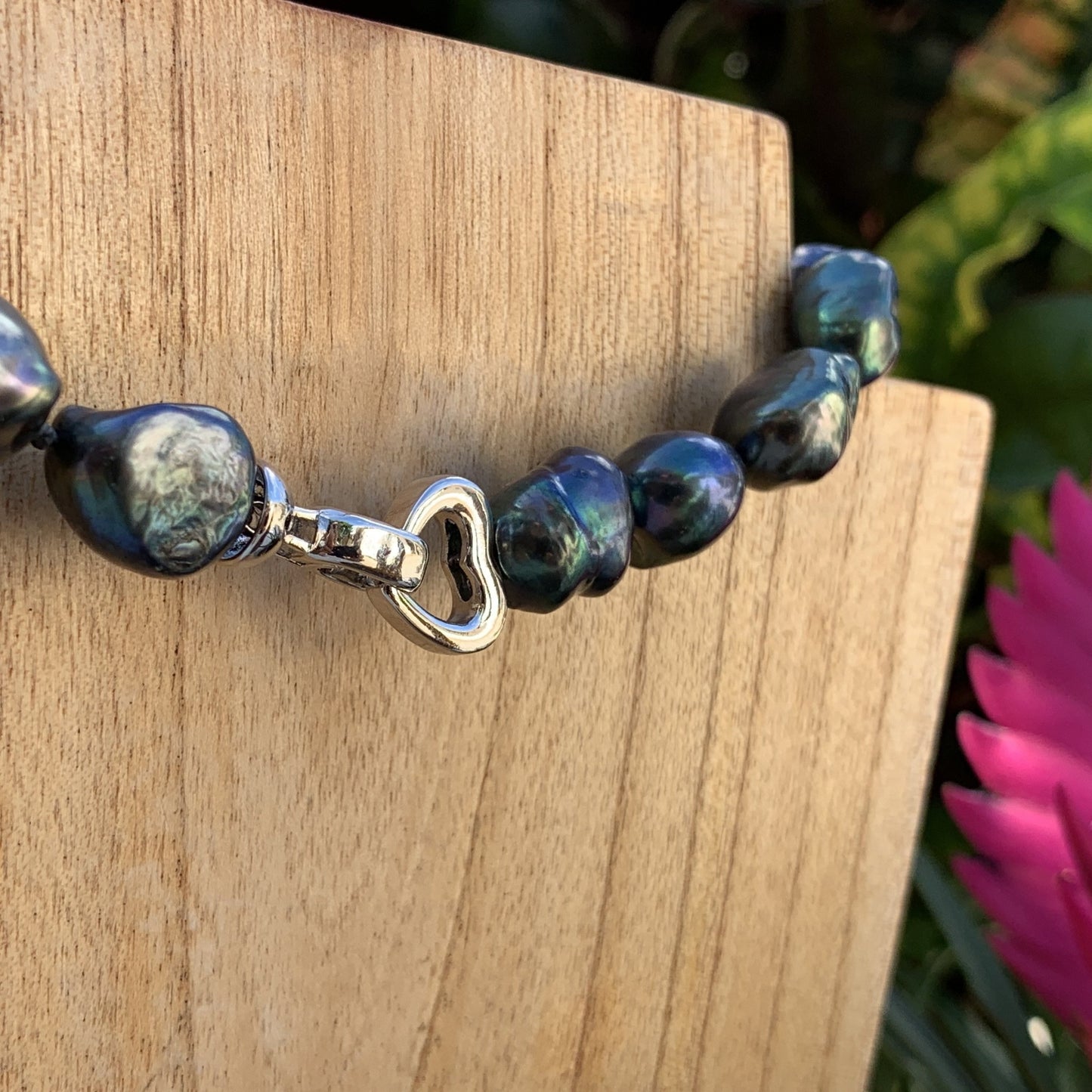 Close up of Baroque pearl necklace clasp.