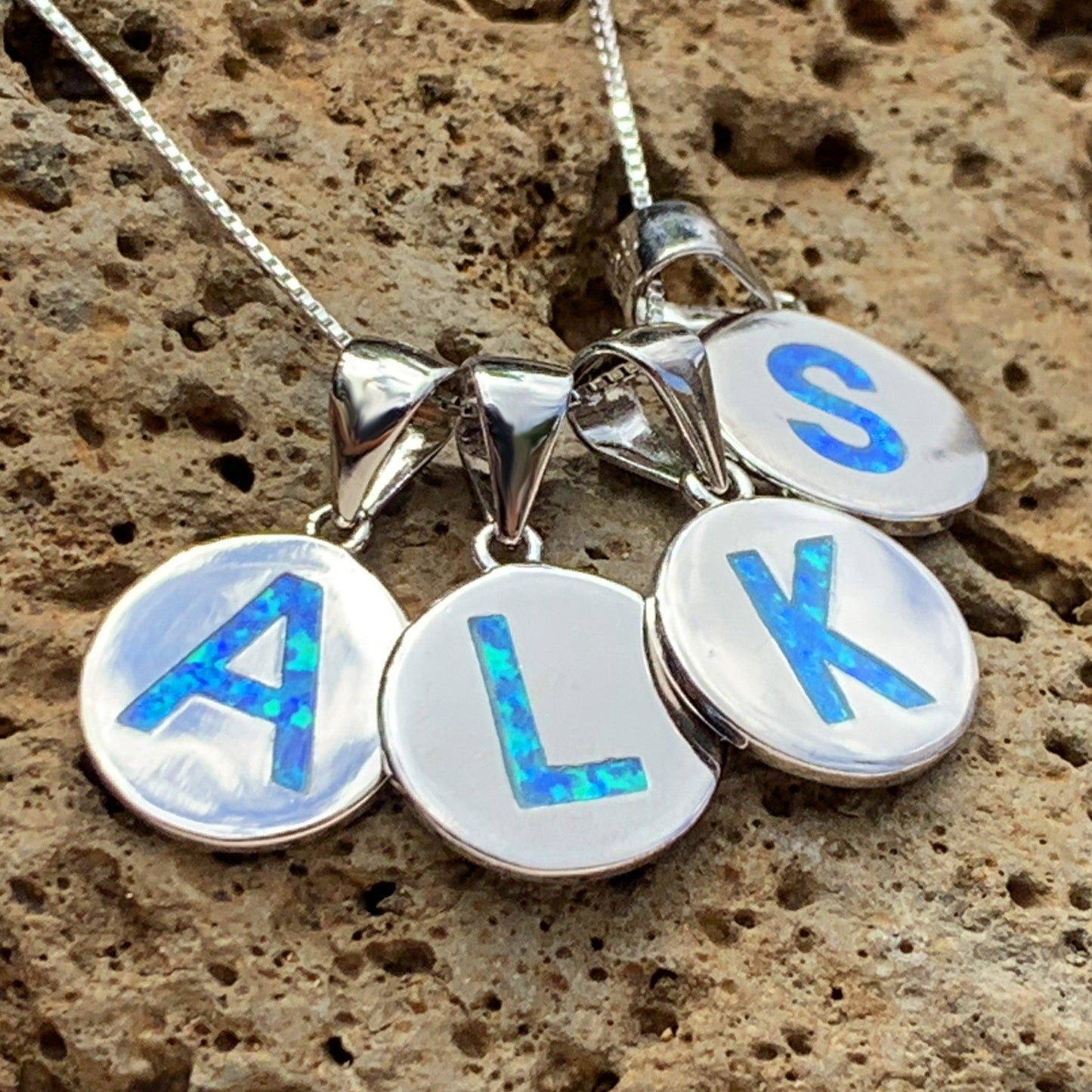 Opalite initials on sterling silver.