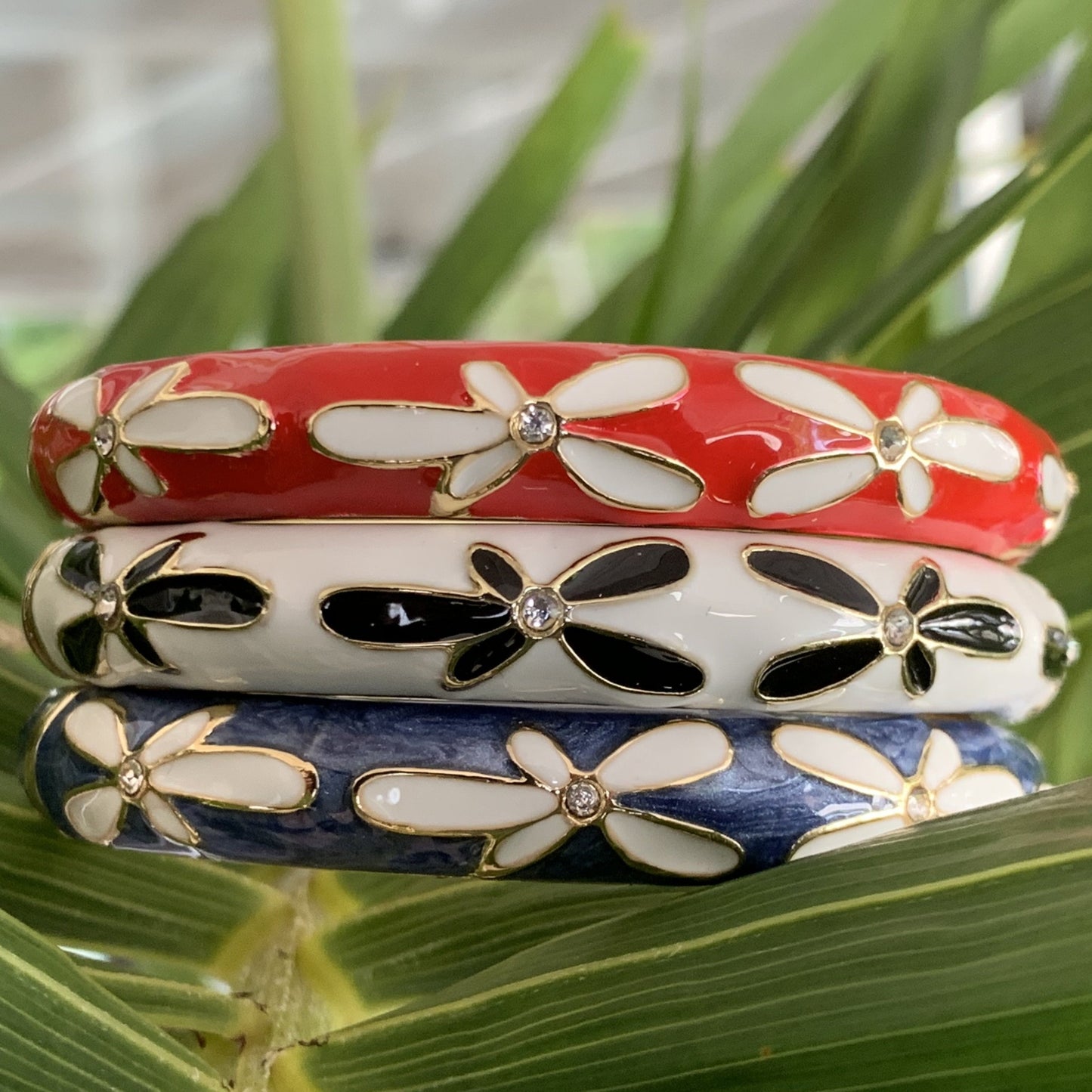 Plumeria Bracelet with Cubic Zirconia showing red, white and blue colors.