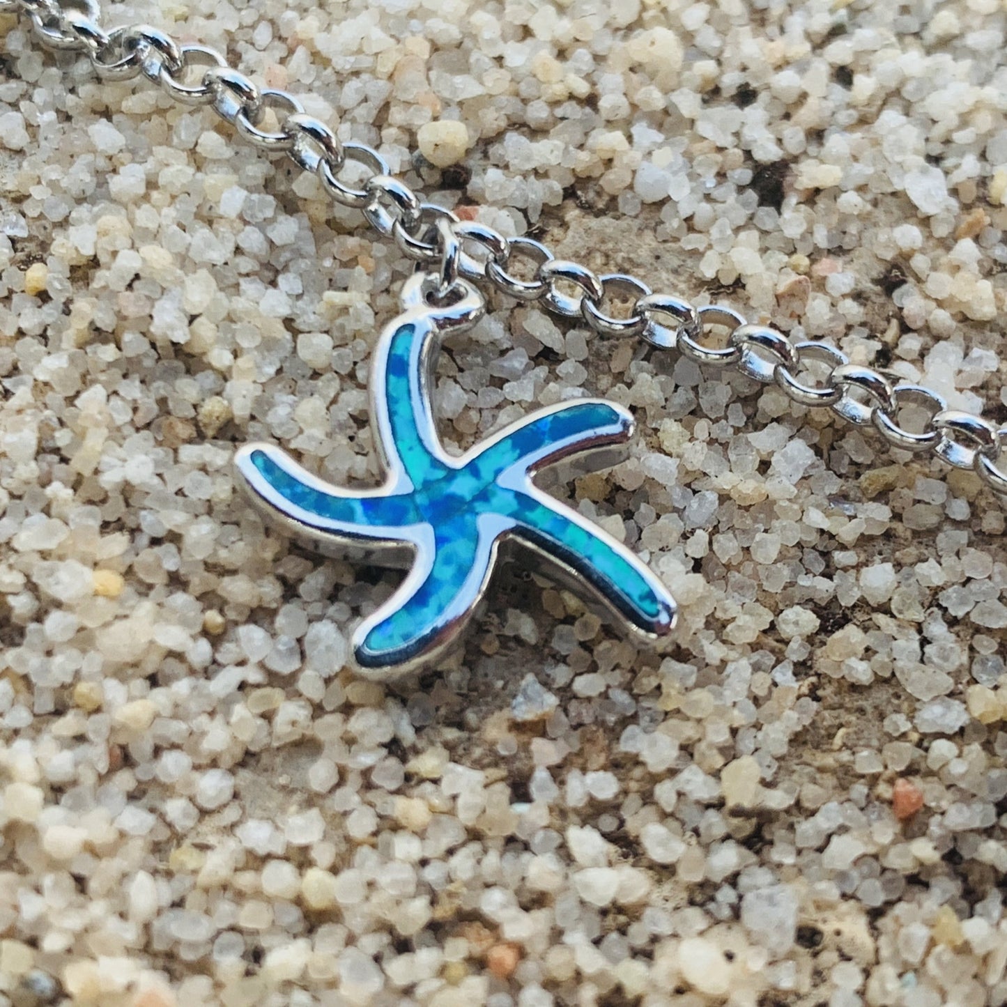 Sea life charm bracelet showing starfish charm.