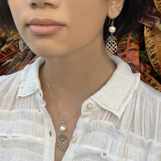 White Pineapple Pearl Tri color earrings shown on model with matching pendant