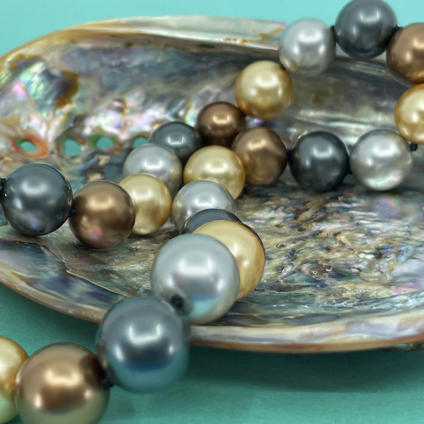 Momi Shell 12MM Pearls in Mauka Colors of Gold and Chocolate