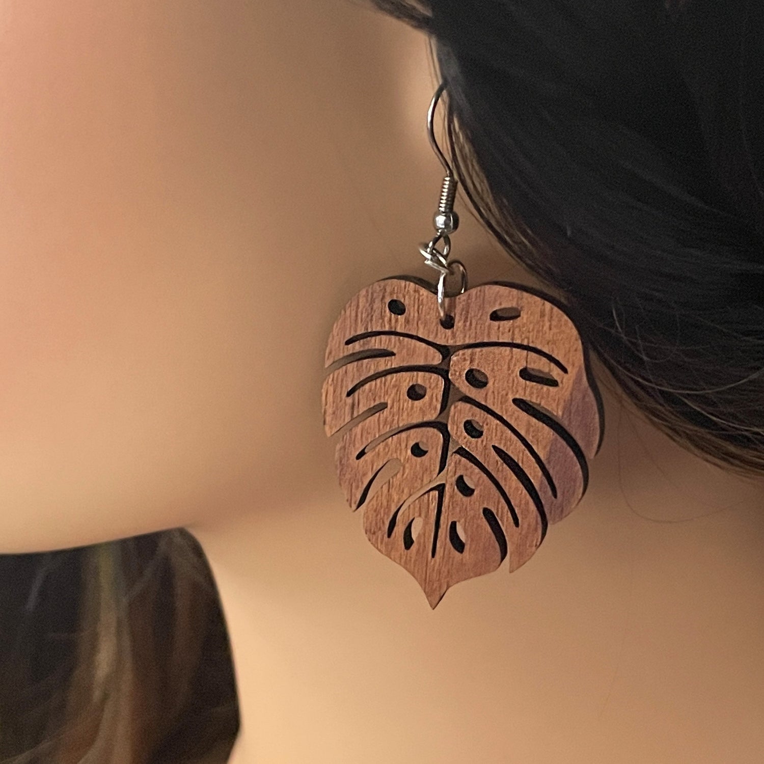Monstera Wood Earrings on Model