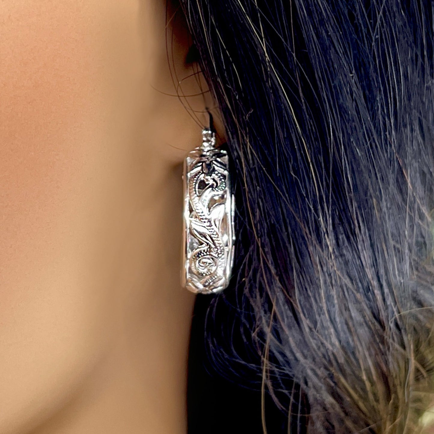 Hawaiian Scroll 3D Cutout Hoop Earrings on model in silver