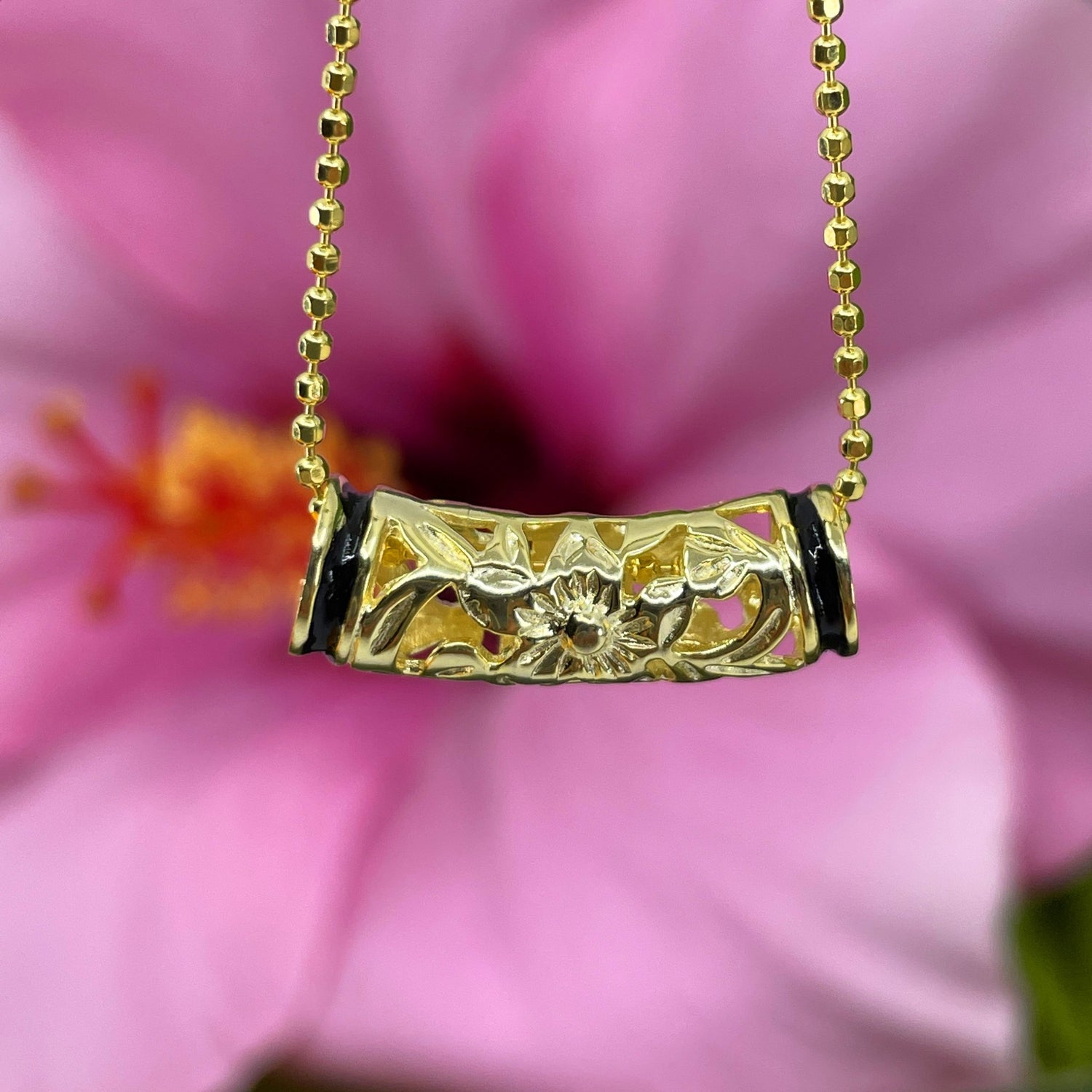 Nahuku Tube Pendant  Gold Plated with Black Boarder