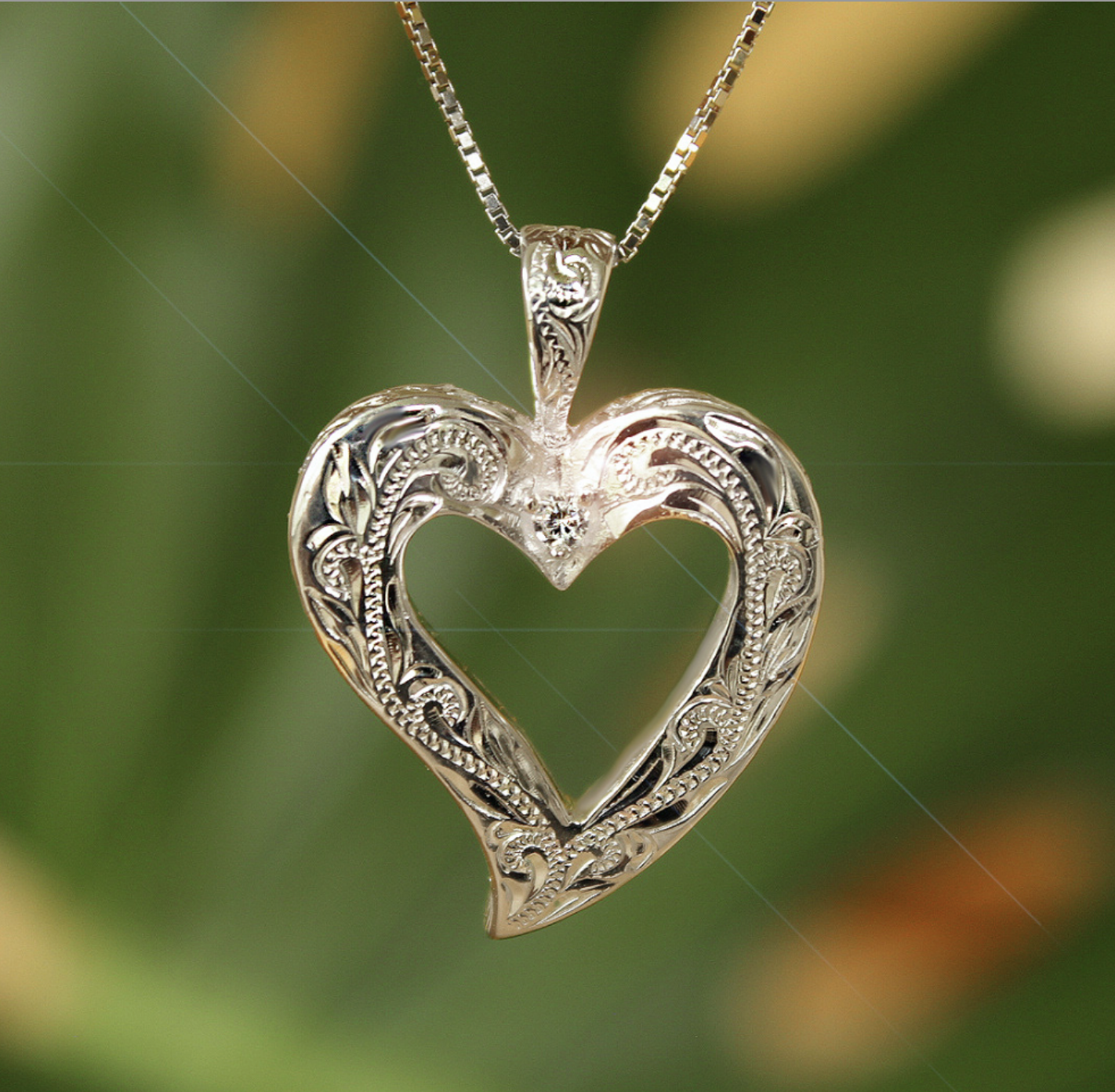 Hawaiian Scroll Open Heart Pendant in .925 Sterling Silver