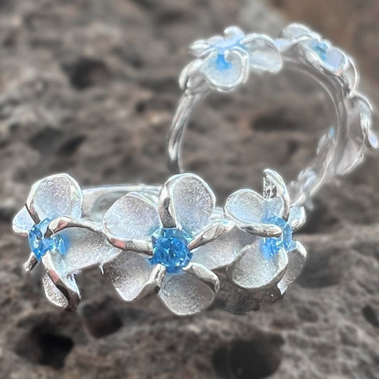 Po'ai Plumeria CZ Huggie Earrings