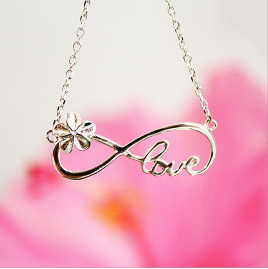 Plumeria Infinity Love Pendant Closeup